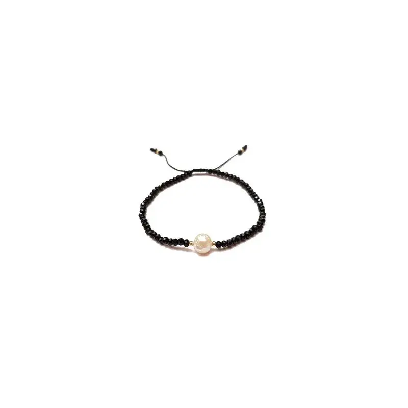 Pulsera criSoundal negro con perla al centro