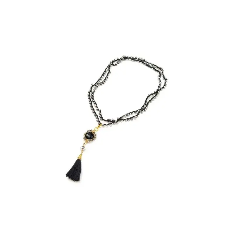 Collar criSoundales plateados con dije y borla