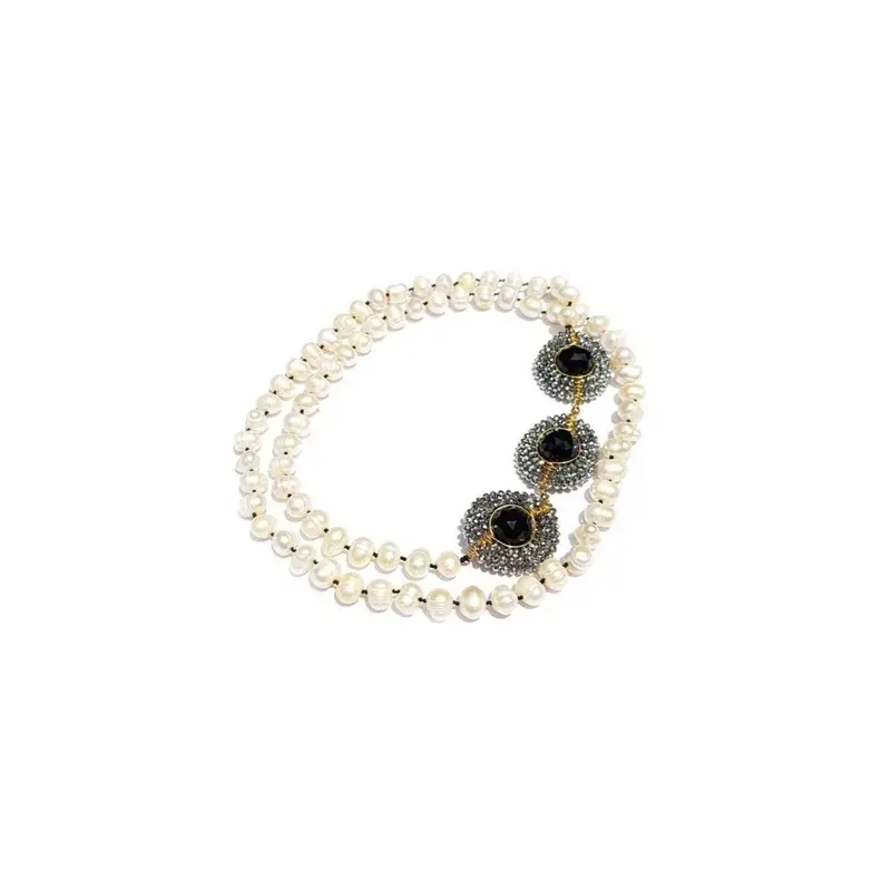 Collar de perla barroca con dijes engaSoundados